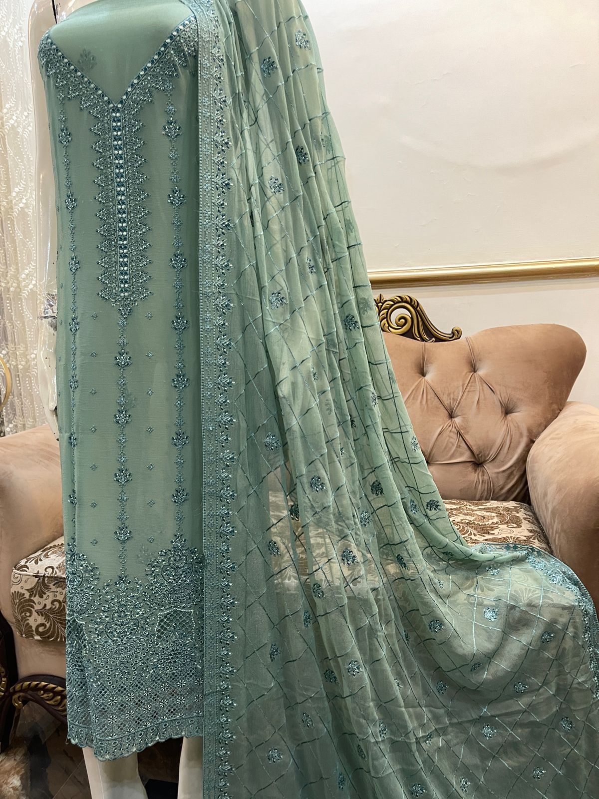 Elegant Pure Chiffon Bareeze outfit with chicken kari borders and an embroidered dupatta in beautiful colors.