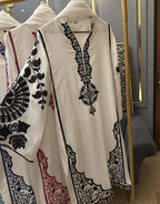 Raw Silk Heavy Embroidered Stiched