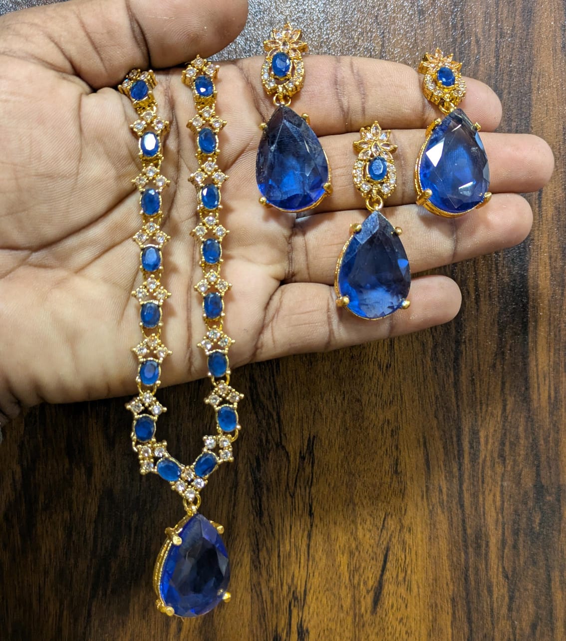 Most beautiful  88 Stone Party Wear Set With Earing Tika