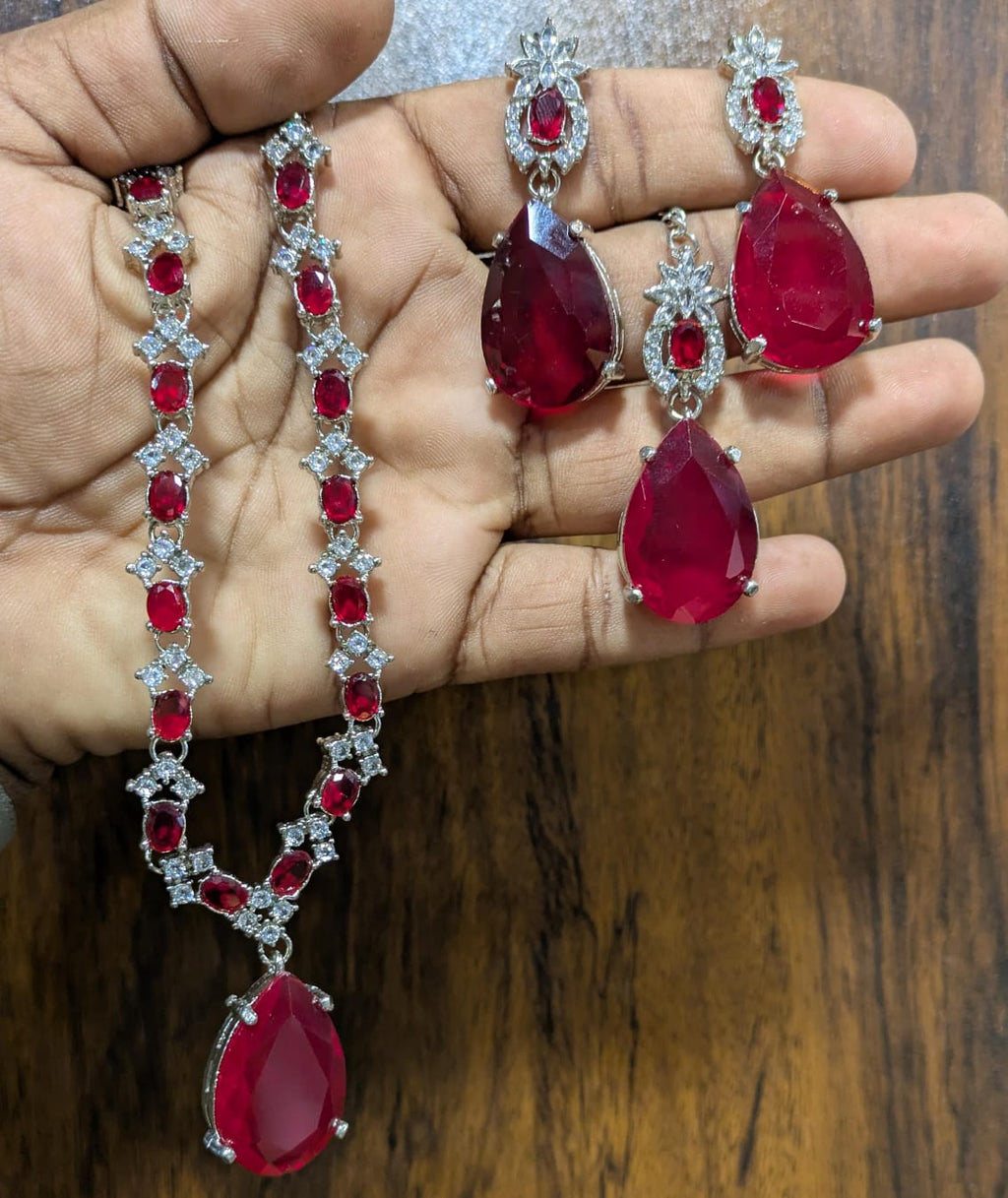 Most beautiful  88 Stone Party Wear Set With Earing Tika