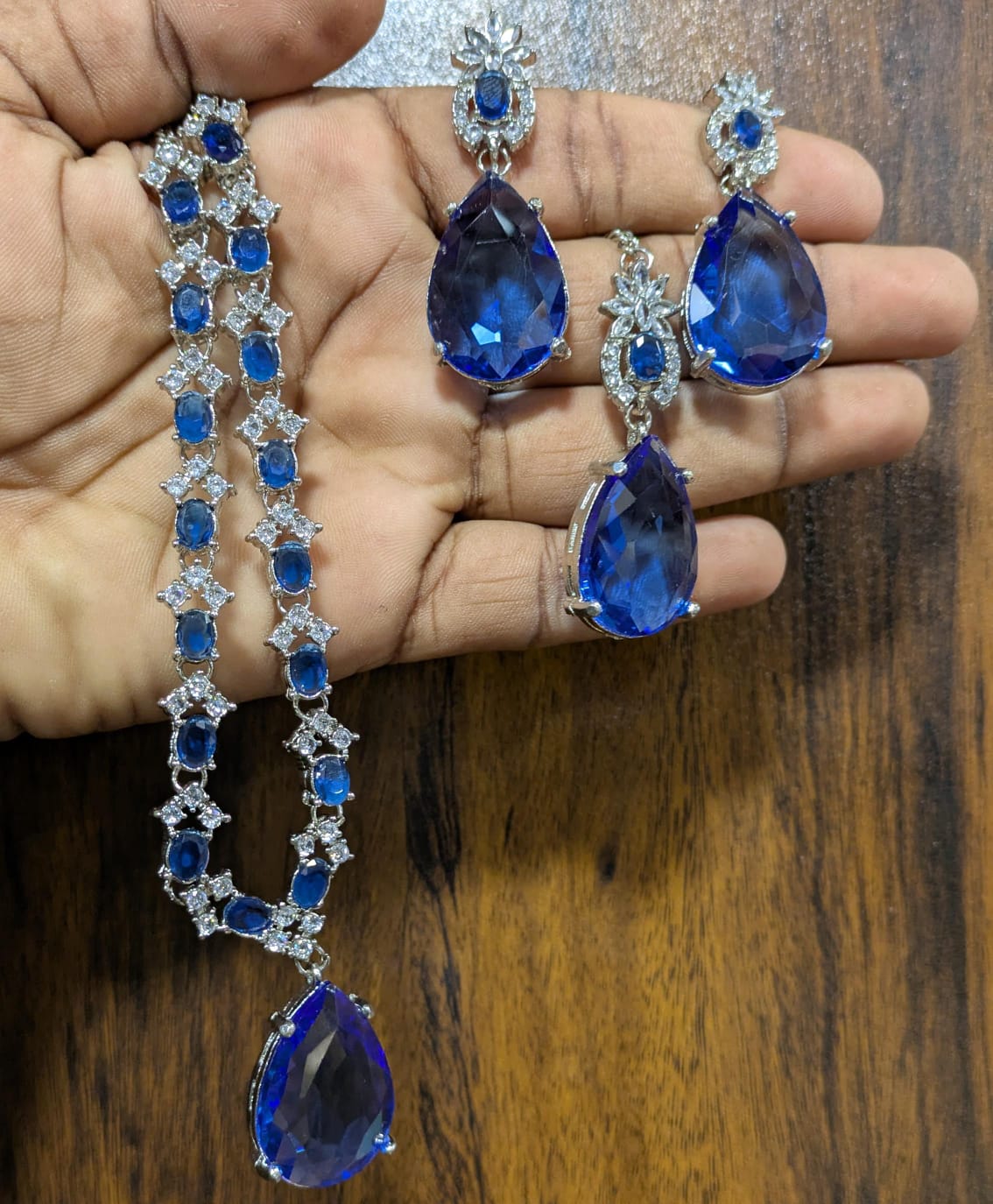 Most beautiful  88 Stone Party Wear Set With Earing Tika